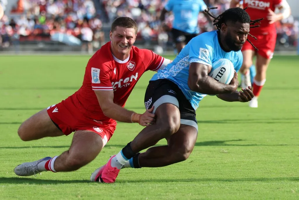 Canadian defender tackles a Fiji ball carrier during the 2026 Pacific Nations Cup semifinal
