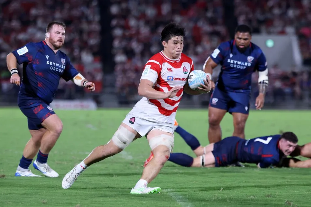 Japan ball carrier breaks into space against the USA in the 2026 Pacific Nations Cup semifinal